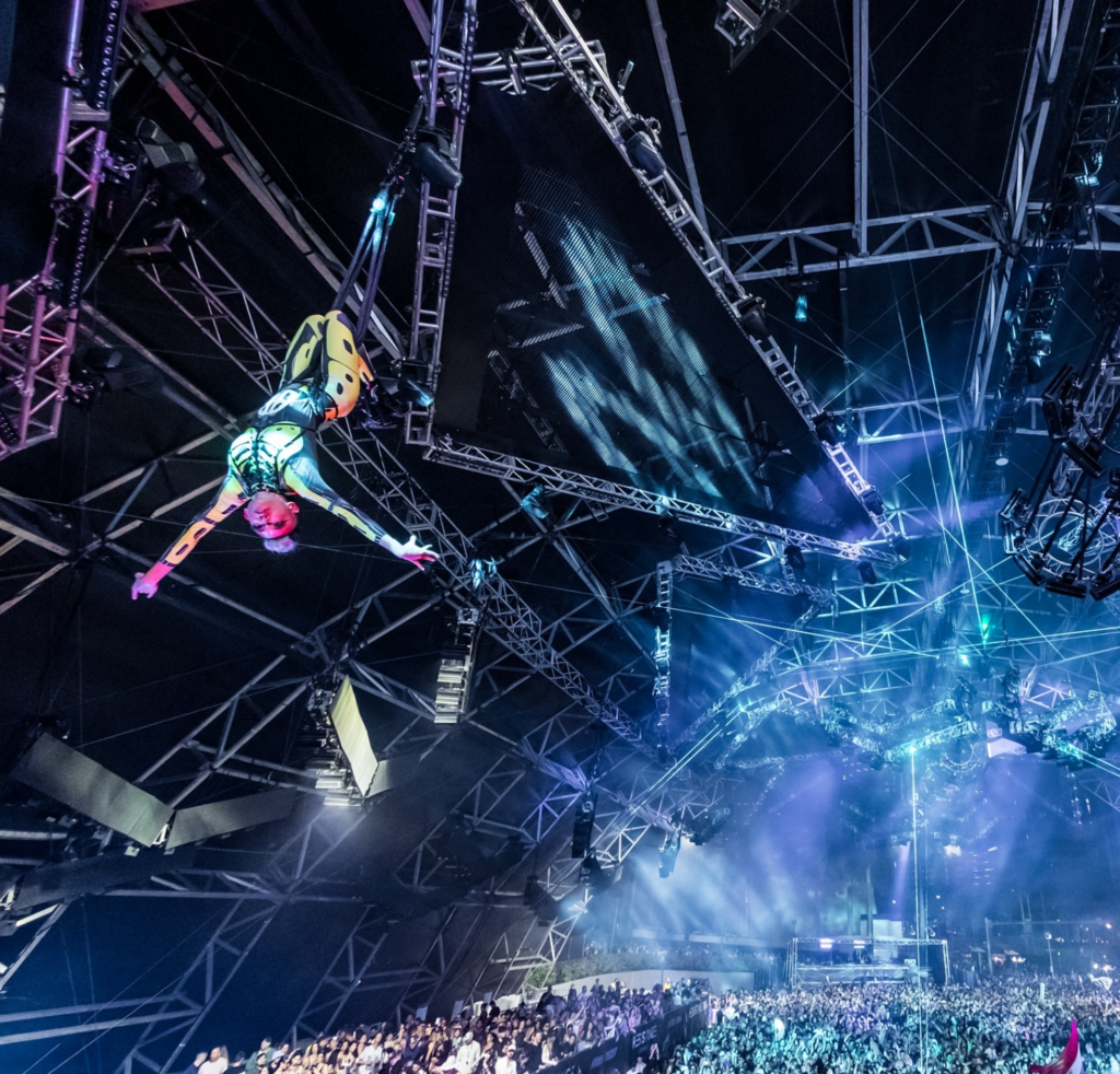 Aerialist Frankie Tan performing at Ultra Music Festival, expected to perform at Robot Sunrise Experience
